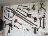 numerous antiques tools for carpentry and shoe making